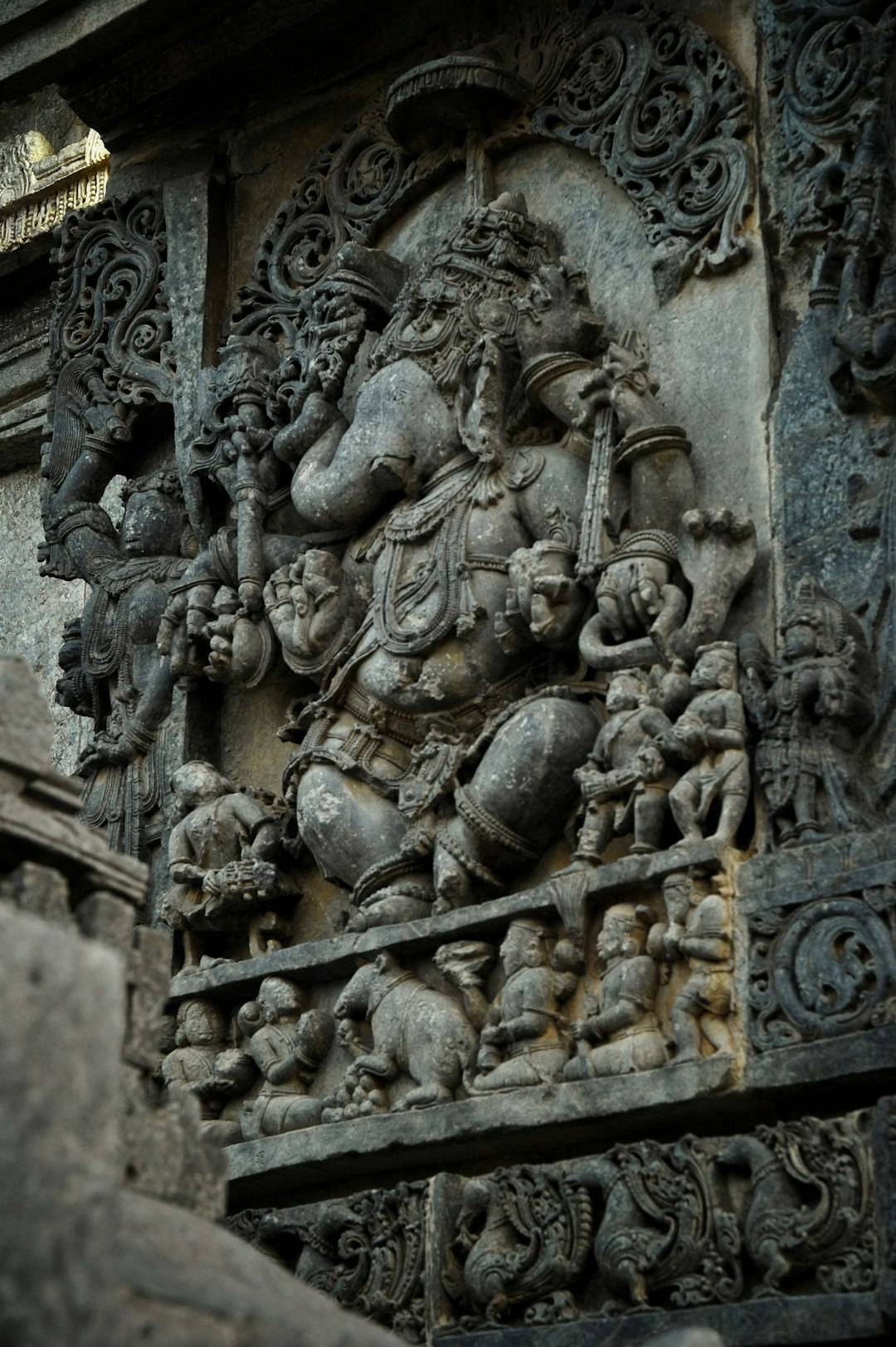 Close-up ancient stone carving on a Khajuraho temple wall