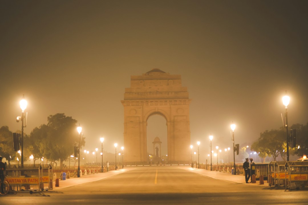 India Gate in New Delhi shrouded in hazy smog at night