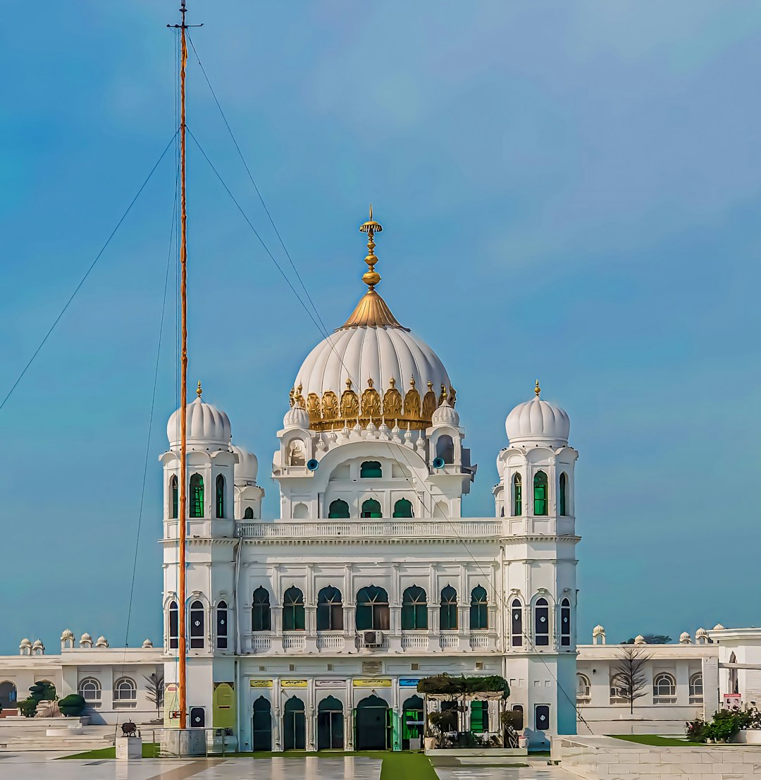 Large white building with a golden dome at Takht Sri Harmandir Ji, Patna Sahib