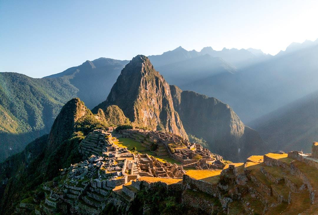 Sunlit ruins of Machu Picchu in the mountains, South America