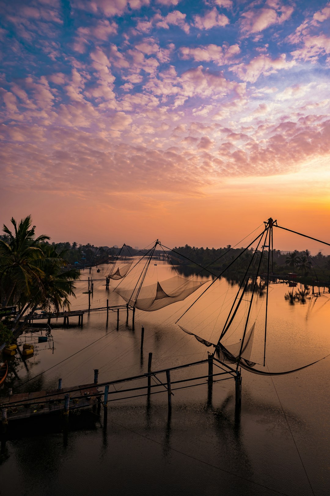 Traditional Chinese fishing nets on the water at Fort Kochi, near where the Cochin Carnival culminates on New Year's Day