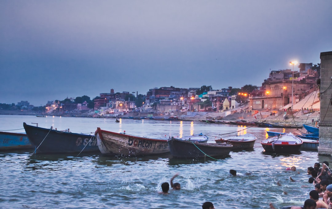 Wooden rowing boats moored at a Varanasi ghat on the Ganges